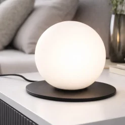 Abat Jour-Ondaluce Abatjour da comodino snail nera sfera vetro bianco