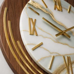 Orologi Da Parete Moderni-Selezionato da Mazzolaluce Grande orologio rotondo da muro effetto marmorizzato dettagli foglia oro 70cm