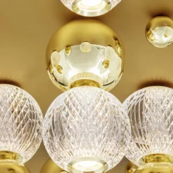 Plafoniere Moderne-Selezionato da Mazzolaluce Grande plafoniera oro sfere trasparenti per salone