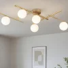 Plafoniere Moderne-Ideal Lux atlas pl5 plafoniera moderna oro sfere vetro