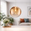 Lampade A Sospensione-Selezionato da Mazzolaluce Lampada a sospensione 20cm sfera vetro ambra sfumato top light