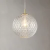 Lampade A Sospensione-Selezionato da Mazzolaluce Lampada a sospensione oro sfera 30 cm di vetro trasparente rigato contemporaneo