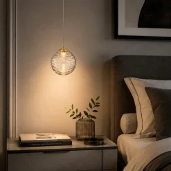 Lampade A Sospensione-Selezionato da Mazzolaluce Lampada a sospensione oro sfera ondulata trasparente led 3000k per comodini camera da letto