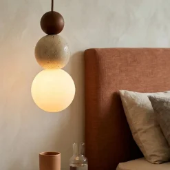Lampade A Sospensione-Selezionato da Mazzolaluce Lampada a sospensione travertino sfera vetro per comodino
