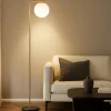 Lampade Da Terra-Selezionato da Mazzolaluce Lampada da terra oro base marmo nero sfera vetro bianco