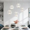 Lampadari Moderni-Selezionato da Mazzolaluce Lampadario a cascata per soggiorno 5 sfere trasparenti oro