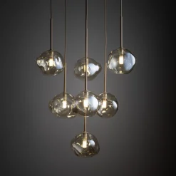 Lampadari Moderni-Selezionato da Mazzolaluce Lampadario a sospensioni in vetro cognac pendenti design moderno per soggiorno