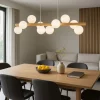 Lampadari Moderni-Selezionato da Mazzolaluce Lampadario di legno sfere in vetro per soggiorno moderno