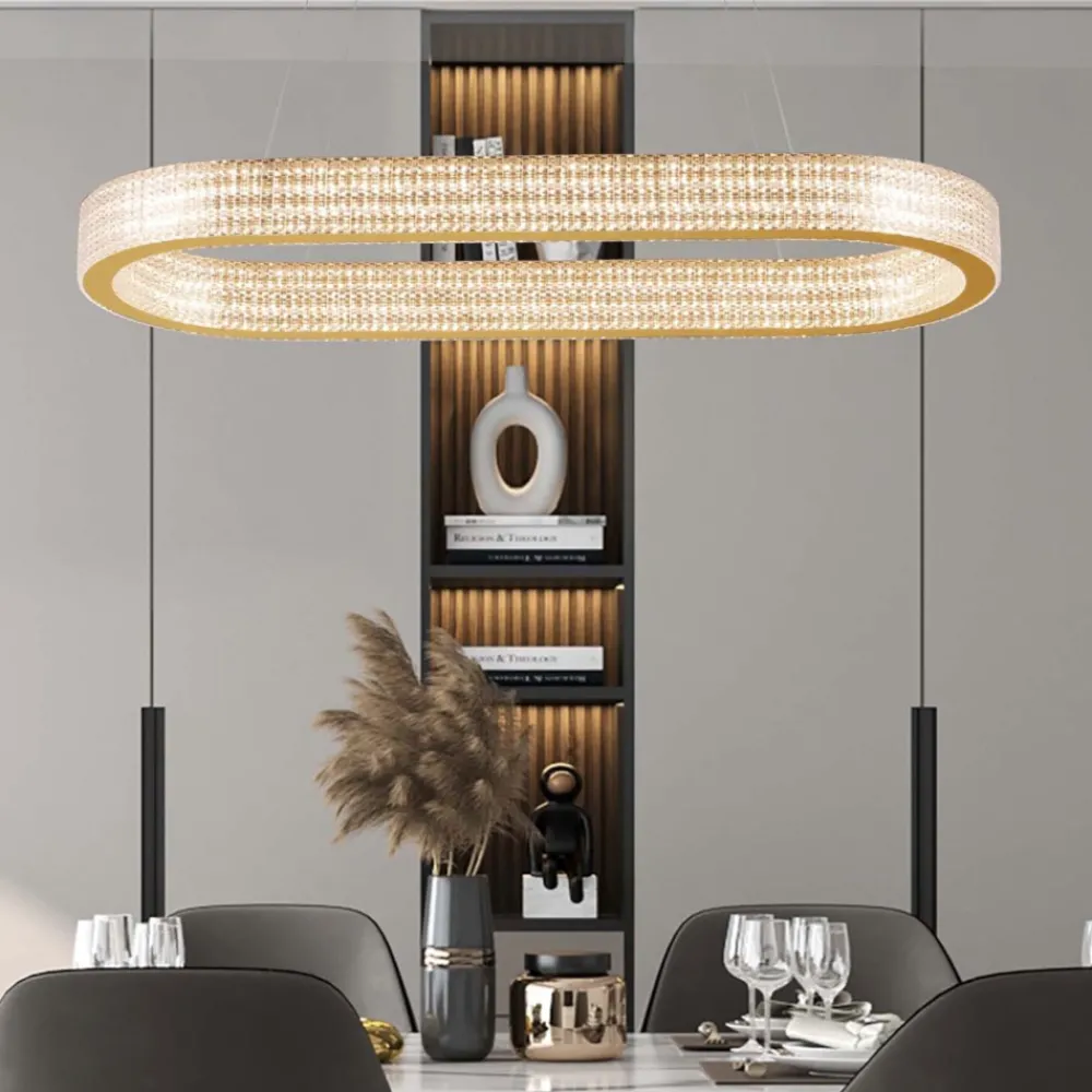 Lampadari Moderni-Selezionato da Mazzolaluce Lampadario elegante ovale oro effetto cristalli per tavolo sala da pranzo