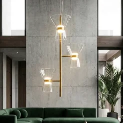 Lampadari Moderni-Selezionato da Mazzolaluce Lampadario led biemissione design oro per soggiorno contemporaneo