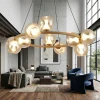 Lampadari Moderni-Selezionato da Mazzolaluce Lampadario led oro tondo con sfere di vetro per soggiorno
