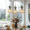 Lampadari Moderni-Selezionato da Mazzolaluce lampadario 3 luci vetri ambra verde per sala da pranzo