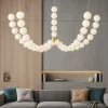 Lampadari Moderni-Selezionato da Mazzolaluce Lampadario moderno con decentramento perle vetro bianco e oro led 3000k
