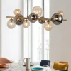 Lampadari Moderni-Selezionato da Mazzolaluce Lampadario moderno per soggiorno oro sfere di vetro