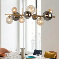 Lampadari Moderni-Selezionato da Mazzolaluce Lampadario moderno per soggiorno oro sfere di vetro