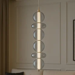 Lampadari Moderni-Selezionato da Mazzolaluce Lampadario moderno verticale oro sfere vetro led 3000k