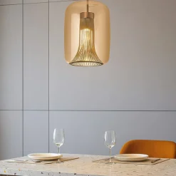 Lampadari Moderni-Selezionato da Mazzolaluce Lampadario oro cilindro di vetro ambra per tavolo da soggiorno