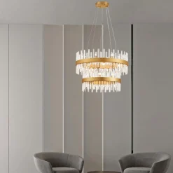 Lampadari Moderni-Selezionato da Mazzolaluce Lampadario oro moderno con cristalli molati trasparenti