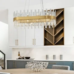 Lampadari Moderni-Selezionato da Mazzolaluce Lampadario oro ovale con cristalli per soggiorno