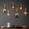 Lampadari Moderni-Selezionato da Mazzolaluce Lampadario oro sfere di vetro fume pendenti per sala da pranzo
