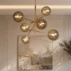 Lampadari Moderni-Selezionato da Mazzolaluce Lampadario oro sfere di vetro fume moderno per soggiorno