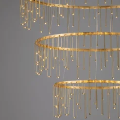 Lampadari Moderni-Selezionato da Mazzolaluce Lampadario per salone stelle cadenti oro ramato moderno led 72w 3000k