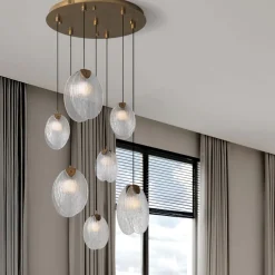 Lampadari Moderni-Selezionato da Mazzolaluce Lampadario per salone stile contemporaneo conchiglie di vetro