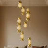 Lampadari Moderni-Selezionato da Mazzolaluce Lampadario per salotto contemporaneo sfere pendenti oro