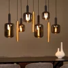 Lampadari Moderni-Selezionato da Mazzolaluce Lampadario per soggiorno sfere in vetro fume cilindri oro