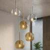Lampadari Moderni-Top Light Lampadario per soggiorno vetri sfere ambra trasparente