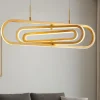 Lampadari Moderni-Selezionato da Mazzolaluce Lampadario per tavolo da pranzo moderno oro orientabile led 3000k