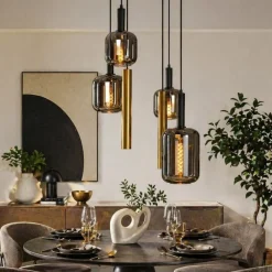 Lampadari Moderni-Selezionato da Mazzolaluce Lampadario sfere vetro e cilindri oro a sospensione per soggiorno
