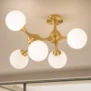 Plafoniere Moderne-Ideal Lux Nodi pl5 plafoniera moderna nodi ottone 5 sfere bianche