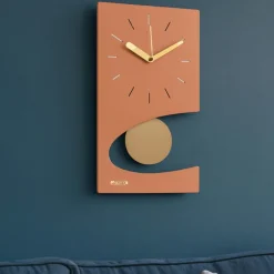 Orologi Da Parete Moderni-Selezionato da Mazzolaluce Orologio da muro moderno color pesca pendolo dorato