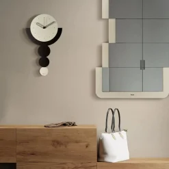 Orologi Da Parete Moderni-Selezionato da Mazzolaluce Orologio da parete moderno con pendolo avorio e nero