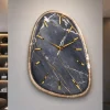 Orologi Da Parete Moderni-Selezionato da Mazzolaluce Orologio da parete moderno effetto marmo scuro dettagli foglia oro