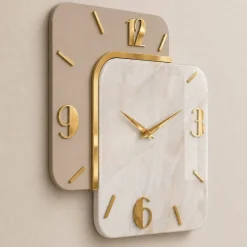 Orologi Da Parete Moderni-Selezionato da Mazzolaluce Orologio da parete moderno in resina effetto marmo dettagli foglia oro
