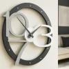 Orologi Da Parete Moderni-Selezionato da Mazzolaluce Orologio da parete moderno rotondo nero grigio design originale