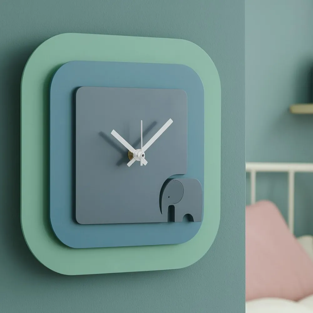 Orologi Da Parete Moderni-Selezionato da Mazzolaluce Orologio moderno da parete design elefantino verde e blu