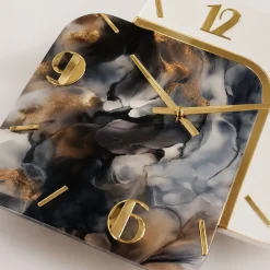 Orologi Da Parete Moderni-Selezionato da Mazzolaluce Orologio moderno da parete in resina effetto marmo dettagli foglia oro
