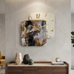 Orologi Da Parete Moderni-Selezionato da Mazzolaluce Orologio moderno da parete in resina effetto marmo dettagli foglia oro