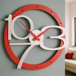 Orologi Da Parete Moderni-Selezionato da Mazzolaluce Orologio rosso da parete moderno in legno traforato