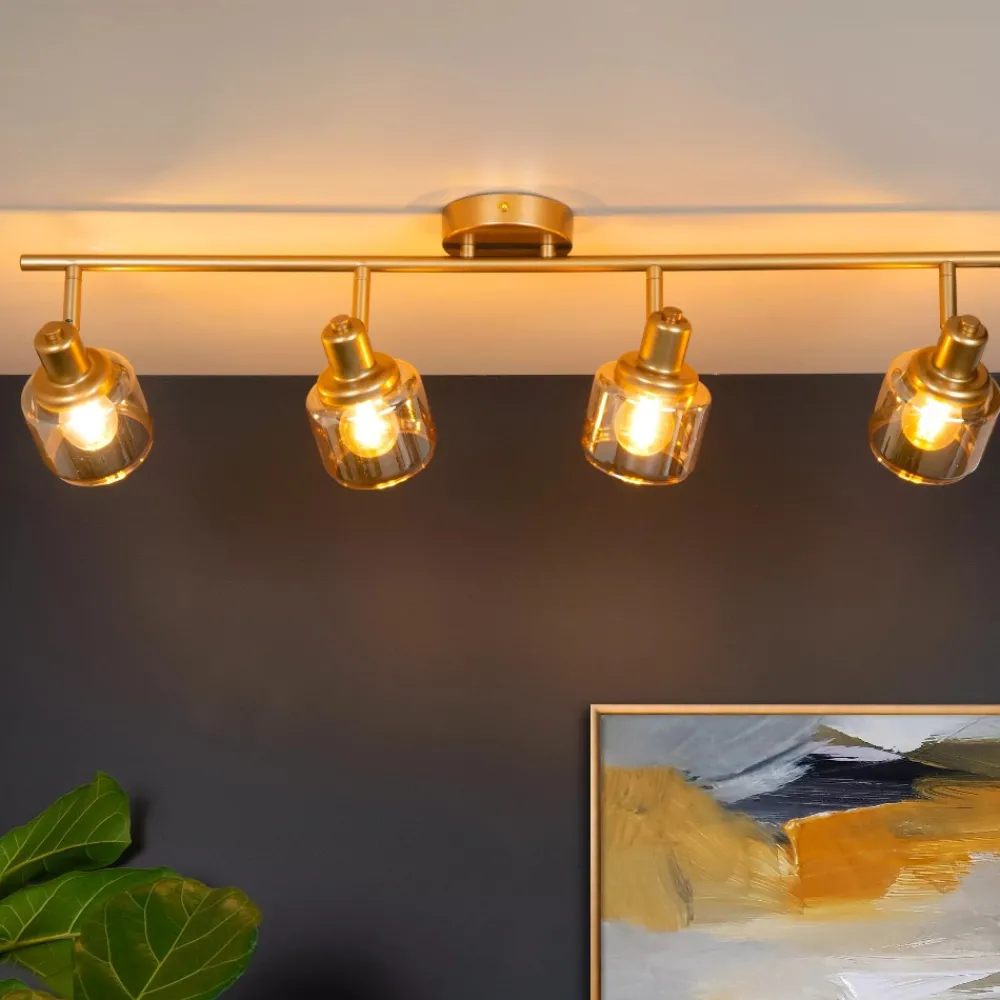 Plafoniere Moderne-Selezionato da Mazzolaluce Plafoniera da soffitto oro con 4 faretti vetri ambra orientabili