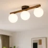Plafoniere Moderne-Selezionato da Mazzolaluce Plafoniera di legno noce moderna sfere vetro bianco