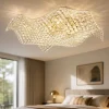 Plafoniere Moderne-Selezionato da Mazzolaluce Plafoniera per camera da letto vela di cristalli struttura oro