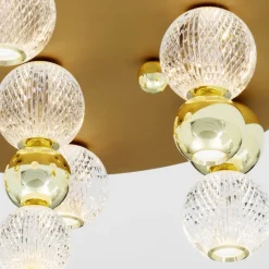 Plafoniere Moderne-Selezionato da Mazzolaluce Plafoniera per camera da letto sfere oro trasparenti contemporanea