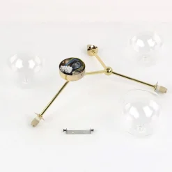 Plafoniere Moderne-Selezionato da Mazzolaluce Plafoniere per cucina moderna oro 3 bocce trasparenti