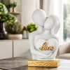 Soprammobili Moderni-Selezionato da Mazzolaluce Scultura soprammobile love moderna oro bongelli preziosi