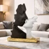 Soprammobili Moderni-Bongelli Preziosi Soprammobile bacio stilizzato scultura oro nero bianco